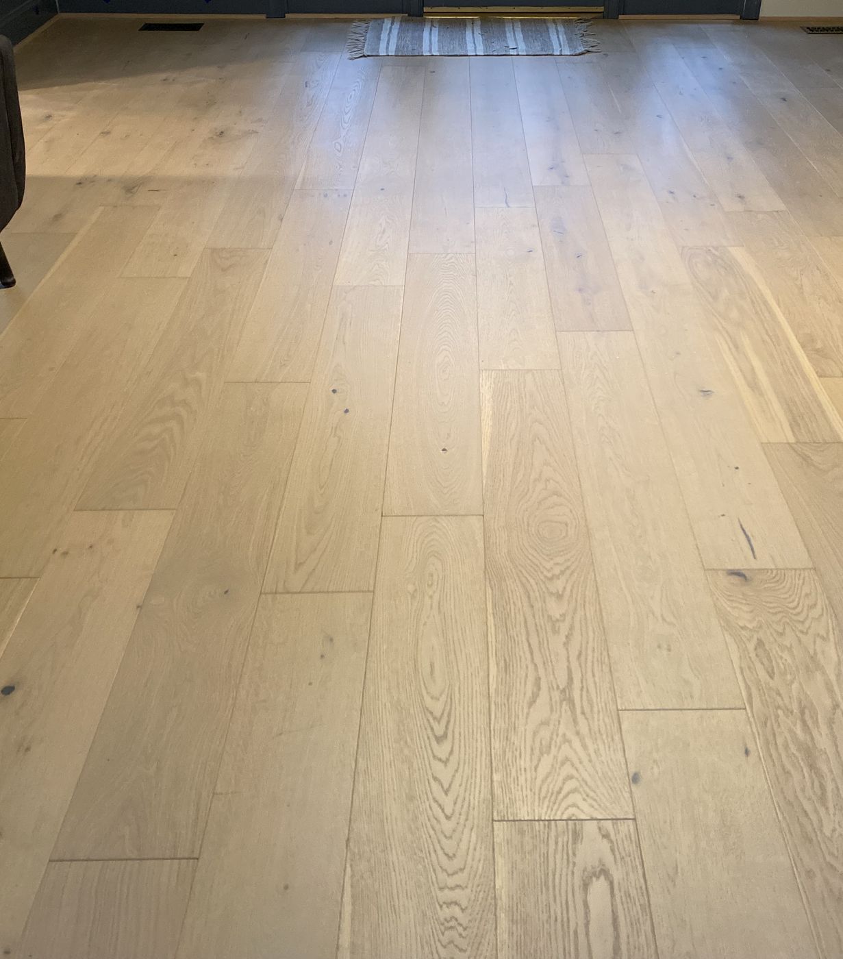 Wide-plank engineered hardwood in a living room