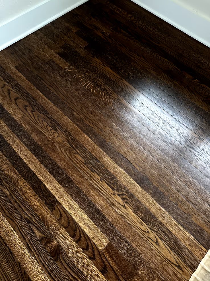 Espresso-stained refinished hardwood close up